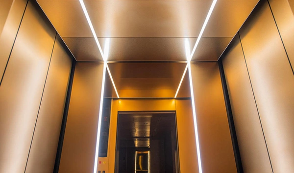 کابین آسانسور دودی طلایی